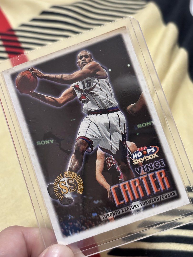 Vince Carter #100 (Category: Raw Singles) located in Rizal. Submitted by mzreas (Listing ID 1464363849, Image 1). Description: 1999-00 SkyBox NBA Hoops #100 Vince Carter Card Details Player: Vince Carter (Toronto Raptors Forward/Guard) Manufacturer / Set: SkyBox / NBA Hoops Card Number: #100 Subset Feature: Sophomore Sensations logo visible on the card.