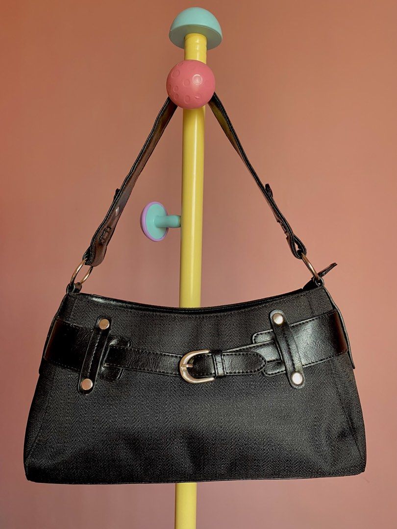 Vintage Black Belted Shoulder Bag (Category: Shoulder Bags) located in Binmaley. Submitted by vanilla_style (Listing ID 1464443506, Image 1). Description: Style: Shoulder / Handbag — Y2K-inspired belted design Color: Classic Black Material: Textured fabric body + smooth faux leather trims & straps Features: ✅ Front buckle detail (decorative) ✅ Adjustable strap with metal eyelets ✅ Gold-tone hardware — rings, rivets, square zipper pull ✅ Back exte