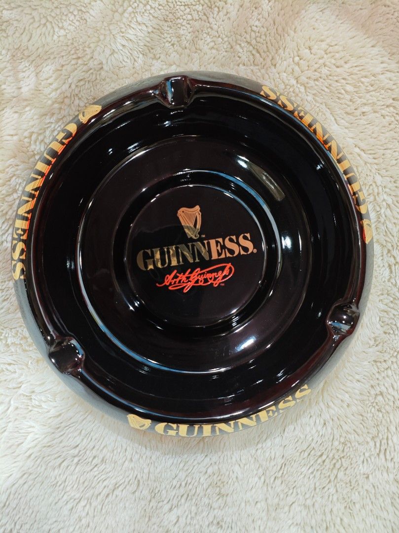 Vintage Guinness Ashtray (Category: Vintage Collectibles) located in Manila. Submitted by zealdragon.e46f60 (Listing ID 1464546706, Image 1). Description: - Brand: Castle Ceramics - Origin: Derby, England - Material: Black Ceramic - Finish: Glossy - Size: 5 - Collectible Barware.