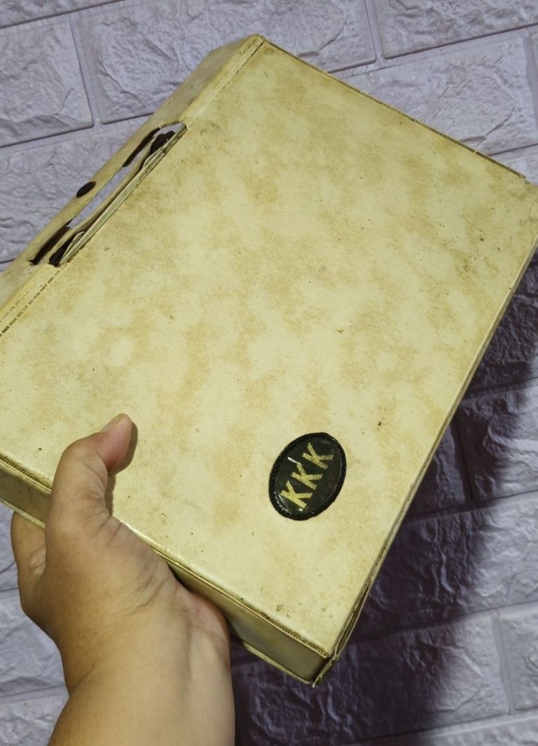 Vintage Mahjong Set with Case and Accessories (Category: Board Games & Puzzles) located in Manila. Submitted by superbass1982 (Listing ID 1464524580, Image 2). Description: - Complete vintage Mahjong set - Includes all tiles, dice, and accessories - Tiles made of durable material - Case features a 'KKK' emblem - Case shows some signs of wear but is fully functional - Great for game nights and Mahjong enthusiasts.