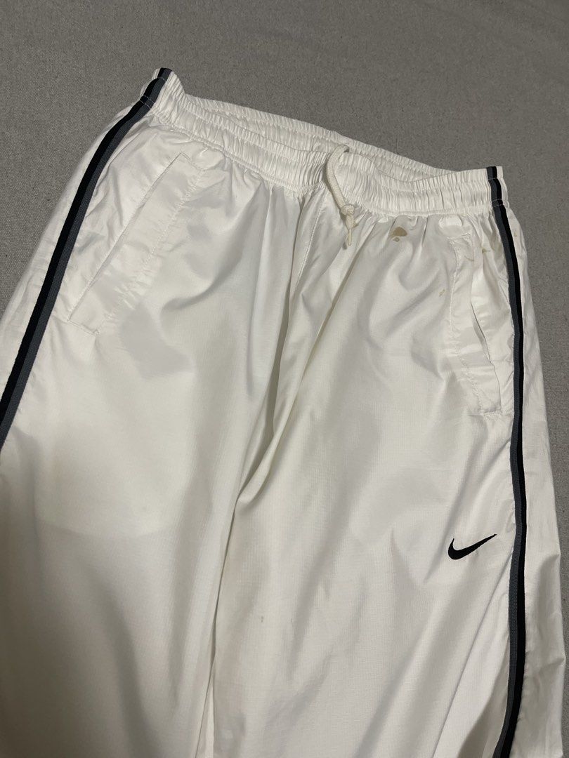 Vintage Nike Embroid Track Pants (Category: Joggers) located in Bulacan. Submitted by sanjisthrift (Listing ID 1464400343, Image 2). Description: Width 26-30 Length 40 Excellent Condition 9/10 Stains.
