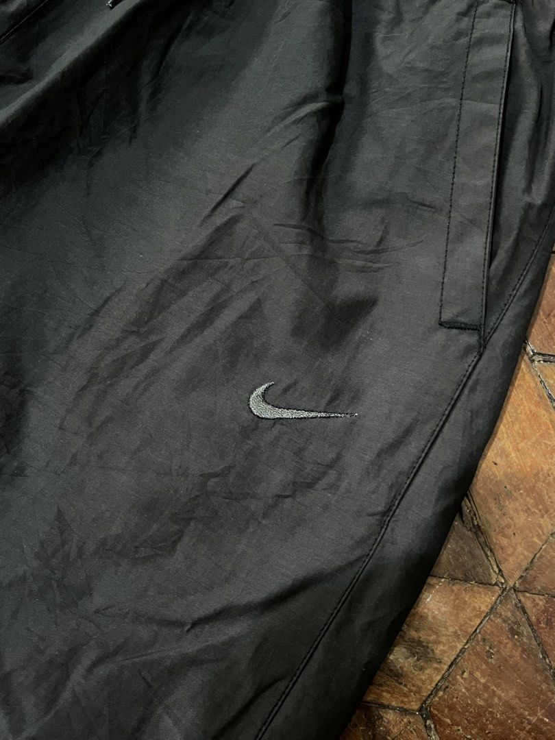 Vintage Nike Track Pants (Category: Jeans) located in Manila. Submitted by oloip.thrift (Listing ID 1464394182, Image 3). Description: Size: XXL on tag Dimes: 30/39 ( adjustable waist ) Leg opening: 8 Color rate: 9/10 Good condition No issue.