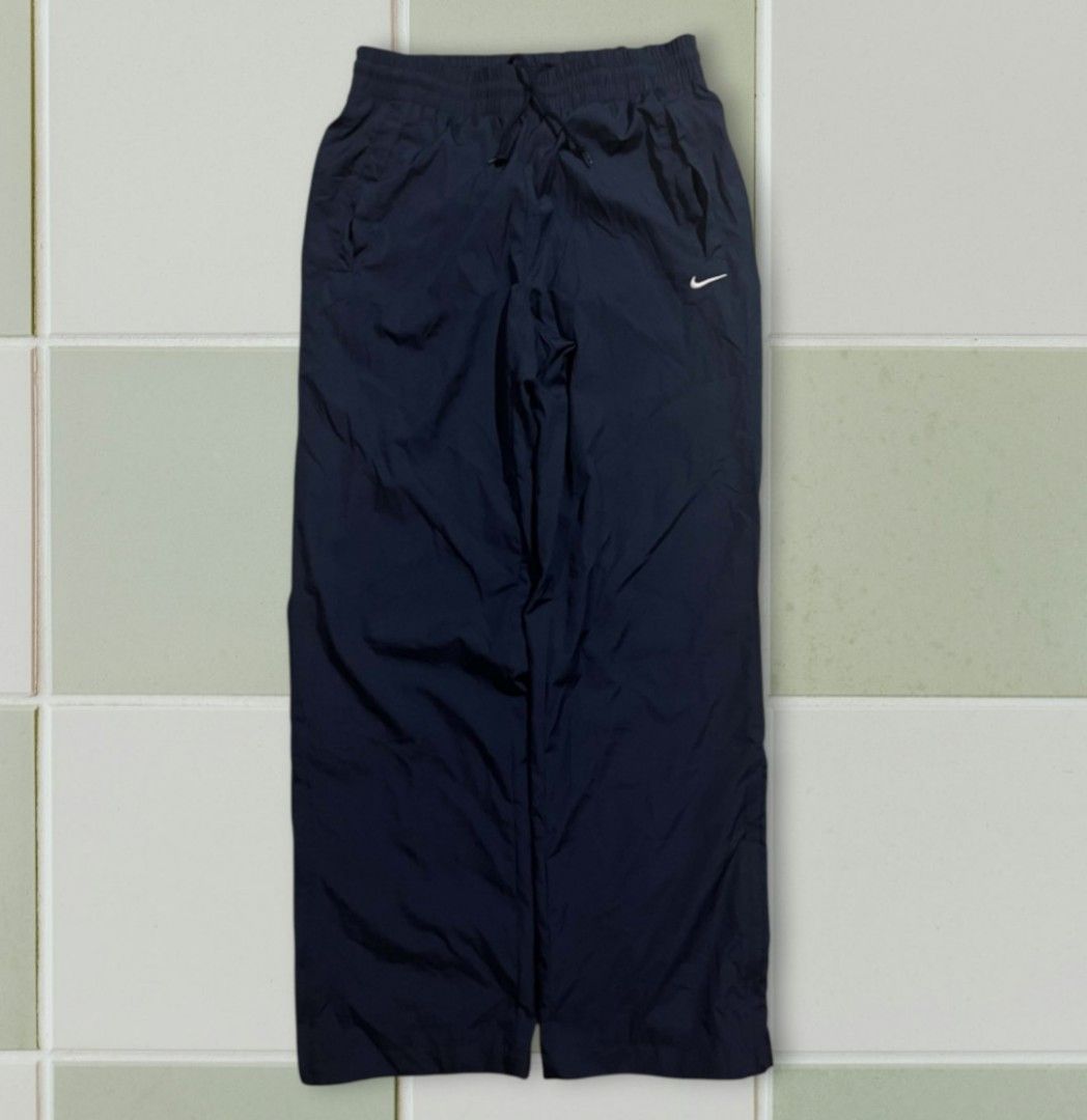Vintage Nike y2k trackpants (Category: Trousers) located in Tayabas. Submitted by sickfinds (Listing ID 1464379320, Image 1). Description: Vintage Nike y2k trackpants Size: M-L Excellent Condition Authentic No flaws.