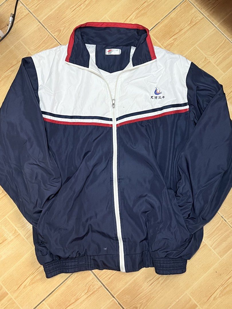 Vintage School Track Jacket (Category: Coats, Jackets and Outerwear) located in Marikina City. Submitted by julmograsell (Listing ID 1464489271, Image 3). Description: - Classic retro track jacket - Color block design - Zip-up front - Elasticated cuffs and hem - Perfect for casual wear or layering - Shows some signs of wear, but in good usable condition - Unique piece for collectors - Visible Chinese markings at the back (idk if removable).