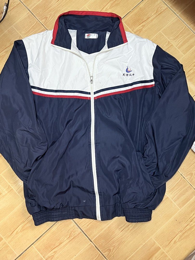 Vintage School Track Jacket (Category: Coats, Jackets and Outerwear) located in Marikina City. Submitted by julmograsell (Listing ID 1464489271, Image 2). Description: - Classic retro track jacket - Color block design - Zip-up front - Elasticated cuffs and hem - Perfect for casual wear or layering - Shows some signs of wear, but in good usable condition - Unique piece for collectors - Visible Chinese markings at the back (idk if removable).