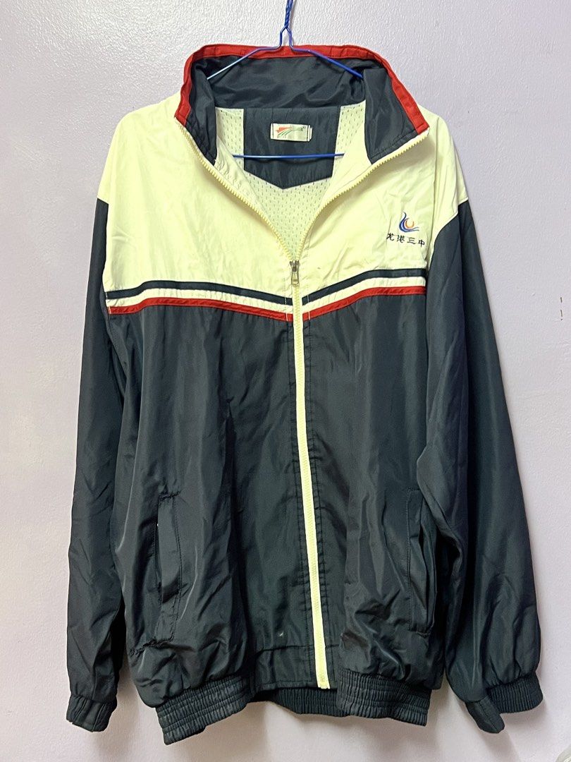 Vintage School Track Jacket (Category: Coats, Jackets and Outerwear) located in Marikina City. Submitted by julmograsell (Listing ID 1464489271, Image 1). Description: - Classic retro track jacket - Color block design - Zip-up front - Elasticated cuffs and hem - Perfect for casual wear or layering - Shows some signs of wear, but in good usable condition - Unique piece for collectors - Visible Chinese markings at the back (idk if removable).