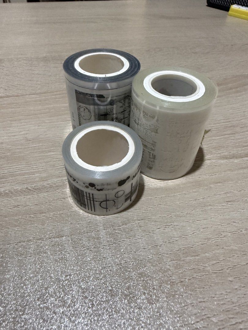 Vintage Style Washi Tape Rolls & Ruler Set (Category: Craft Supplies & Tools) located in Pasig City. Submitted by boredtakoyaki (Listing ID 1464388527, Image 2). Description: - Set of 3 vintage-style washi tape rolls - Designs include old newspaper clippings, stamps, and ruler markings - Comes with a clear ruler featuring measurements and designs - Ideal for journaling, scrapbooking, and decorating - Plenty of tape remaining on each roll.