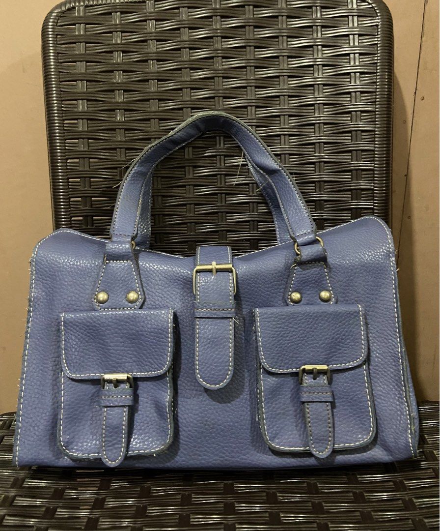Vintage Y2K Style Blue Shoulder Bag (Category: Shoulder Bags) located in Guinobatan. Submitted by jadieee_young22 (Listing ID 1464524109, Image 2). Description: Vintage Y2K Style Blue Shoulder Bag - color: dusty blue - synthetic leather material - front cargo buckle pockets, top flap closure, inner zipper pocket - good pre-loved condition. has minor loose threads on strap edges (pls check photos), but structure is solid and fully functional Rfs: 