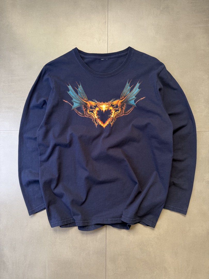 Vintage y2k The Dragon longsleeve (Category: Tshirts & Polo Shirts ) located in Santa Rosa. Submitted by arvintage.ph (Listing ID 1464503246, Image 2). Description: Tagged: Cut tag, fits medium-large Width 21.5” | Length 27.5” | Sleeves 23” Condition: Great condition Issue(s): - .