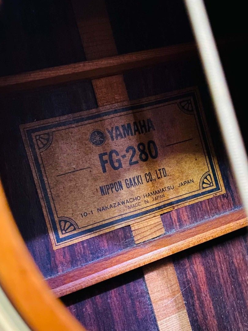 Vintage Yamaha fg-280 green label (Category: Musical Instruments) located in Quezon City. Submitted by jaycrisminosa2 (Listing ID 1464471921, Image 3). Description: - Yamaha acoustic guitar - Natural wood finish - Dark pickguard - Signs of wear consistent with use (body) - Tuners and bridge appear intact - Ready for a new owner.