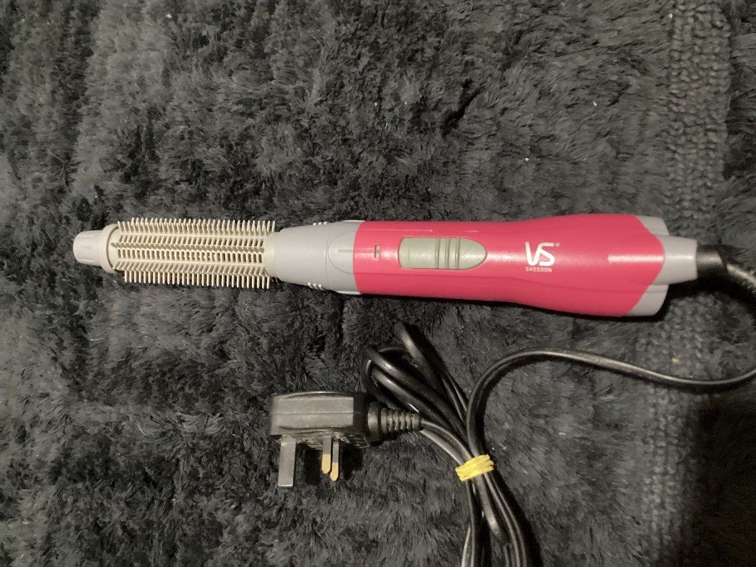 VS Sassoon Hot Air Styler Brush (Category: Hair) located in Lucena. Submitted by box_it (Listing ID 1464443099, Image 1). Description: Complete set w box & receipts - VS Sassoon rotating hot air styler brush - Color: Pink and Grey - Features: Adds volume and styles hair - Condition: Works well - Plug type: UK plug - Reason for selling: No longer used.