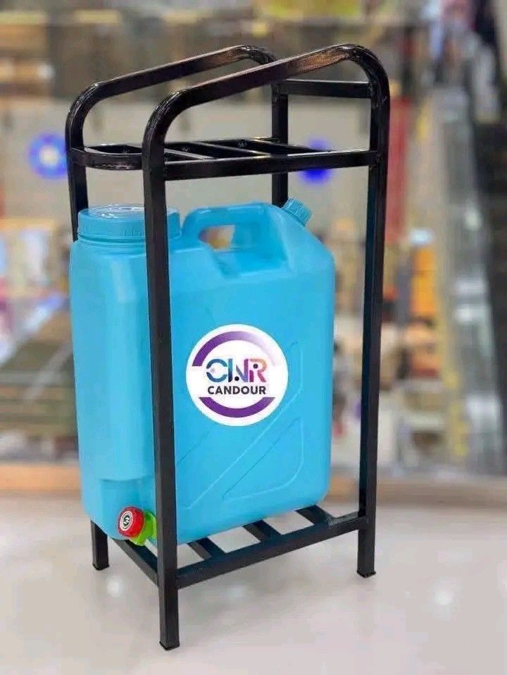 Water Dispenser Stand with Water Jug (Category: Water Purifiers & Dispensers) located in Quezon City. Submitted by marecel146 (Listing ID 1464380865, Image 2). Description: - Sturdy metal stand for water jugs - Includes a convenient tap - Available in pink or blue - Ideal for home or office - Keeps water jug elevated for easy dispensing.