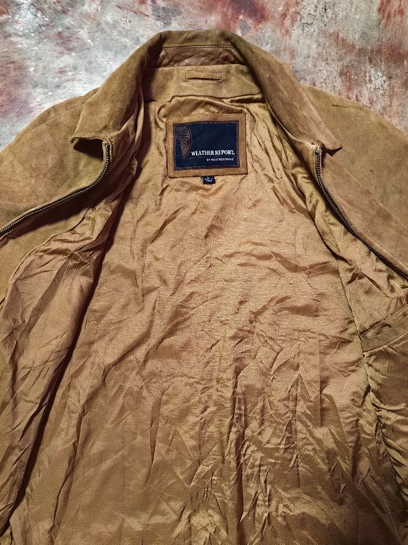 Weatherproof Suede Zip-Up Jacket (Category: Coats, Jackets and Outerwear) located in Tarlac. Submitted by jeremiah.curator.2026 (Listing ID 1464416319, Image 3). Description: - Classic tan suede jacket - Zip-up front closure - Two functional front pockets - Button cuffs on sleeves - Lined interior for comfort - Ideal for cooler weather.