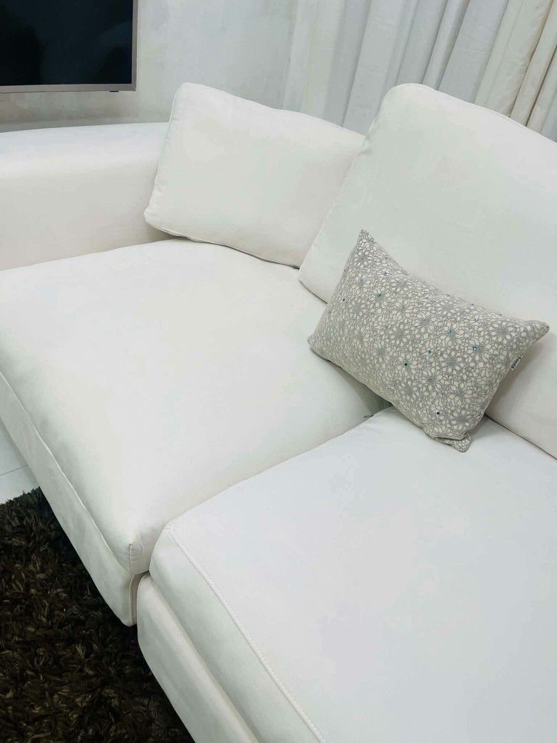 White 3-Seater Sofa with Gold Legs (Category: Sofas) located in Antipolo. Submitted by roselle001 (Listing ID 1464444480, Image 3). Description: - Comfy white 3-seater sofa - Plush cushions for ultimate comfort - Stylish gold legs - Modular design for flexible configurations - Ideal for living rooms and lounges - Approximate dimensions: 115" L x 41" W x 37" H - Comes with decorative throw pillows.