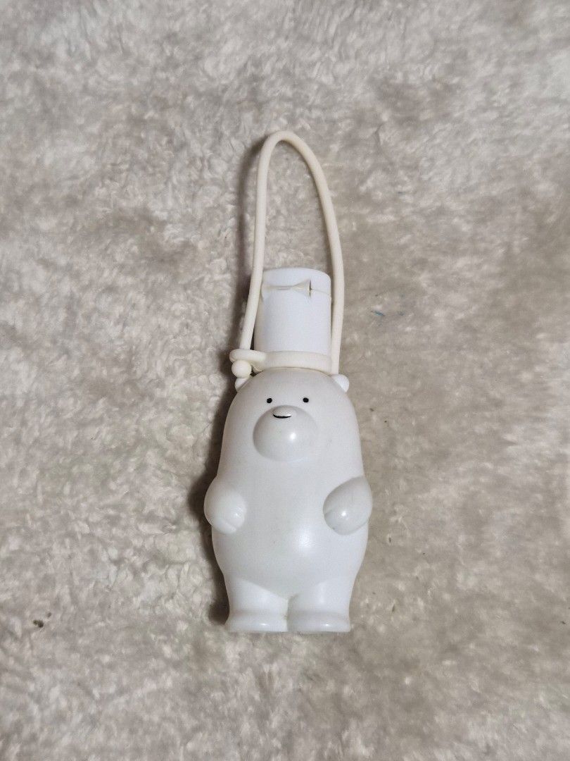 White Bear Keychain Charm with Loop (Category: Charms) located in Mandaue City. Submitted by chuchi152615 (Listing ID 1464403482, Image 2). Description: - Adorable white bear charm. - Perfect for personalizing keys, bags, or other accessories. - Features a cute lying-down pose. - Detailed with small black eyes and a tiny nose. - Made from durable white plastic material..