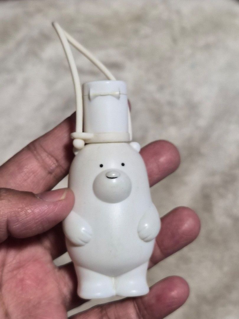 White Bear Keychain Charm with Loop (Category: Charms) located in Mandaue City. Submitted by chuchi152615 (Listing ID 1464403482, Image 1). Description: - Adorable white bear charm. - Perfect for personalizing keys, bags, or other accessories. - Features a cute lying-down pose. - Detailed with small black eyes and a tiny nose. - Made from durable white plastic material..