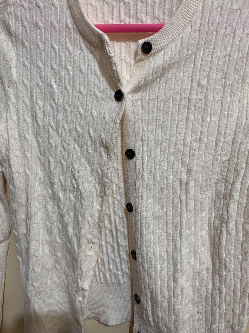 White Cable Knit Button Up Cardigan (Category: Coats, Jackets and Outerwear) located in Legazpi City. Submitted by sandras. (Listing ID 1464519762, Image 2). Description: - Cozy white cable knit cardigan - Long sleeves - Button-up front closure - Classic crew neck style - Ideal for layering during cooler weather - Estimated size: Small to Medium.