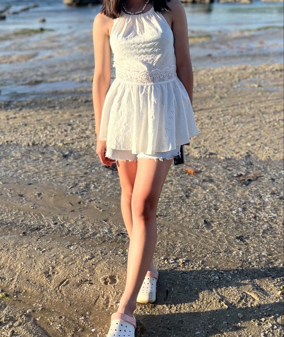 White Eyelet Halter Top with Lace Trim (Category: Sleeveless) located in Manila. Submitted by mysticcat15 (Listing ID 1463940234, Image 3). Description: rfs:decluttering mop:gcash mod:jnt - Ties at the neck - Ideal for summer or beach vacations - Pairs well with shorts or skirts.