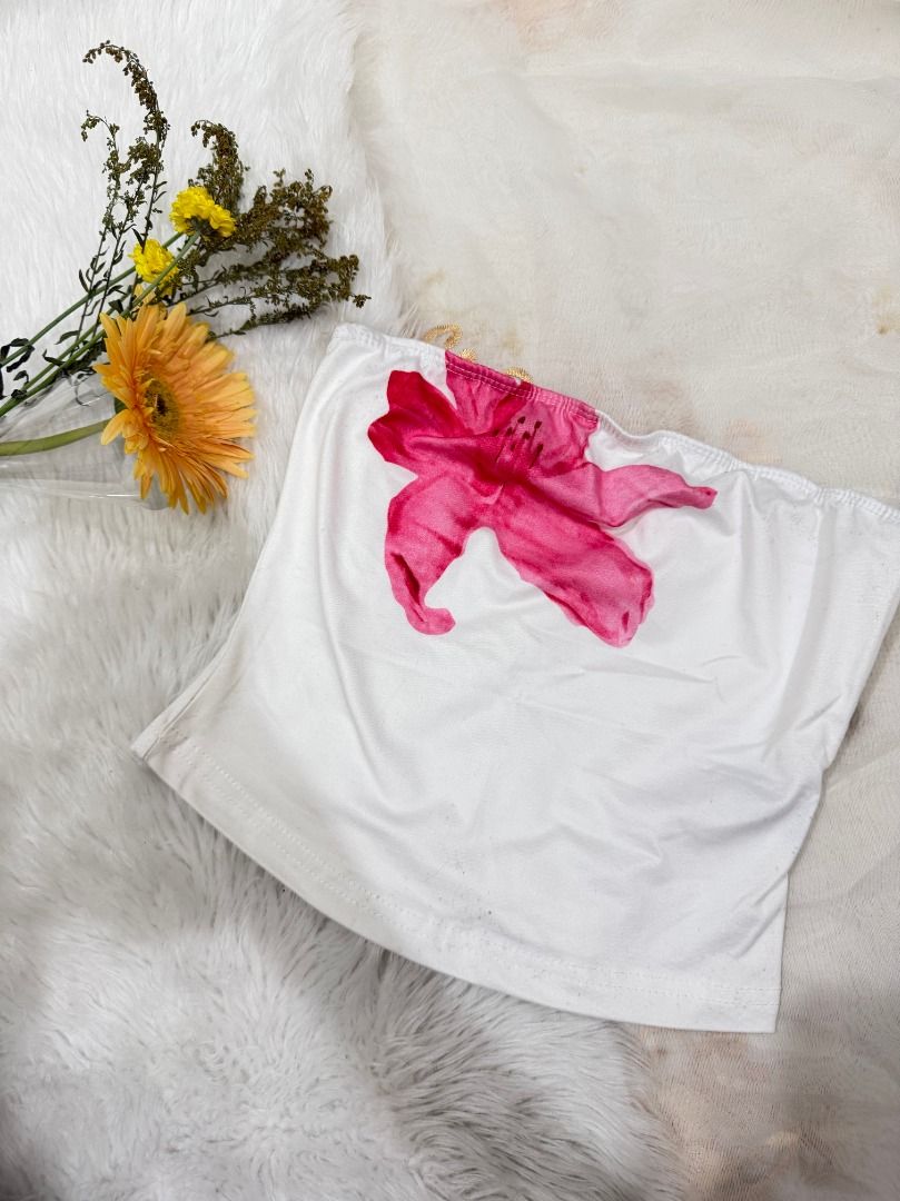 White Floral Tube (Category: Others Tops) located in Mandaluyong City. Submitted by prelovedbyrinoa_ (Listing ID 1464362630, Image 1). Description: • Preloved / gently used • XS - Small • Good condition | need wash.