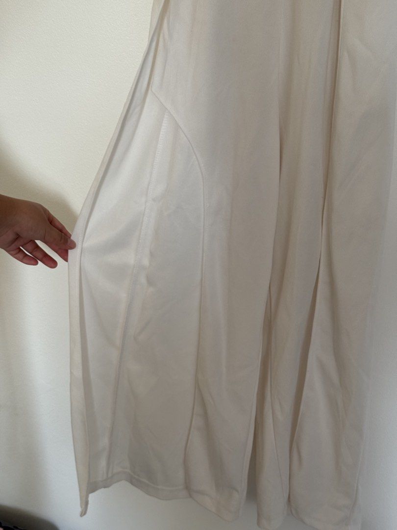 White Jumpsuit (Category: Jumpsuits) located in Makati City. Submitted by dorisvinalon (Listing ID 1464444362, Image 3). Description: White Summer Jumpsuit Bust: 24-30 in Length: 43 in Features: Slit in both legs, Zipper at the back, Stretchable, Adjustable strap.