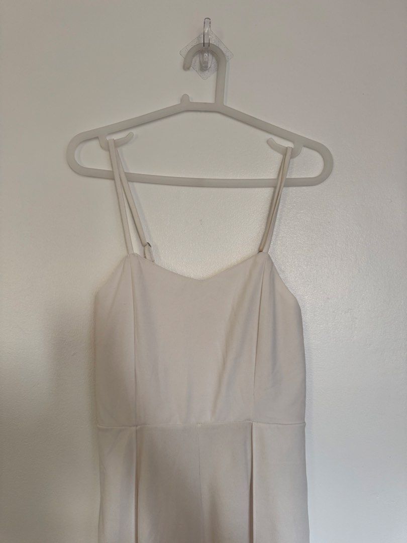 White Jumpsuit (Category: Jumpsuits) located in Makati City. Submitted by dorisvinalon (Listing ID 1464444362, Image 2). Description: White Summer Jumpsuit Bust: 24-30 in Length: 43 in Features: Slit in both legs, Zipper at the back, Stretchable, Adjustable strap.