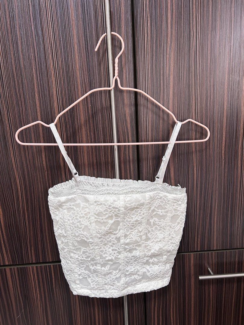 White Lace Corset Top One Size Stretchable (Category: Sleeveless) located in Cebu City. Submitted by pau.ky (Listing ID 1464486847, Image 2). Description: -RFS: Decluttering - White lace corset top - Stretchy material, fits one size - Used only once - Versatile: wear on its own or layer - Super cute and trendy design.