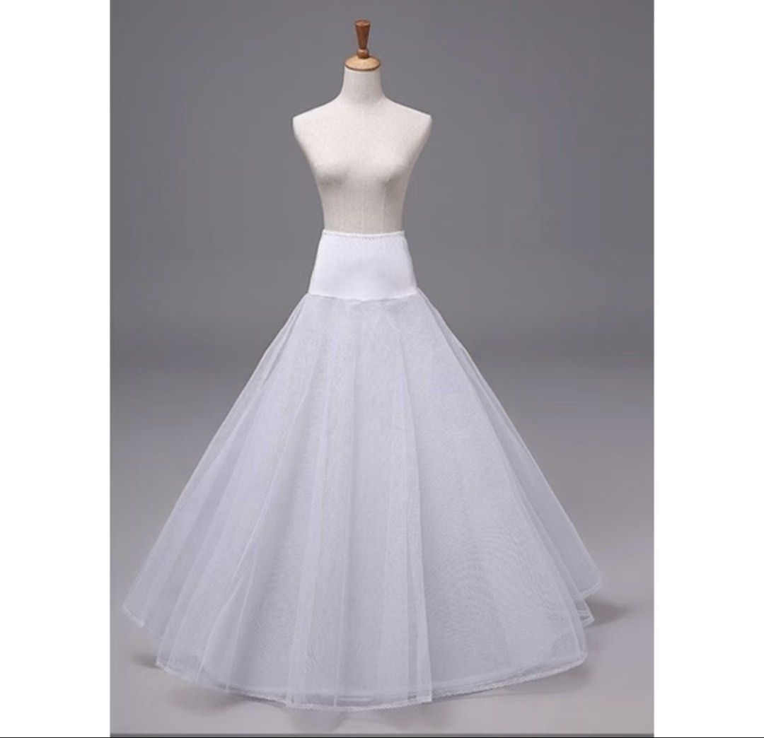 White Petticoat Underskirt for Gown (Category: Skirts) located in Manila. Submitted by jhie24 (Listing ID 1464524159, Image 3). Description: -Freesize - White underskirt for wedding dresses - Adds volume and shape for a beautiful princess silhouette - Comfortable elasticated waistband - Features multiple tulle layers - Delicate lace trim at the hem - Enhances the flow and movement of your gown -no metal hoops.