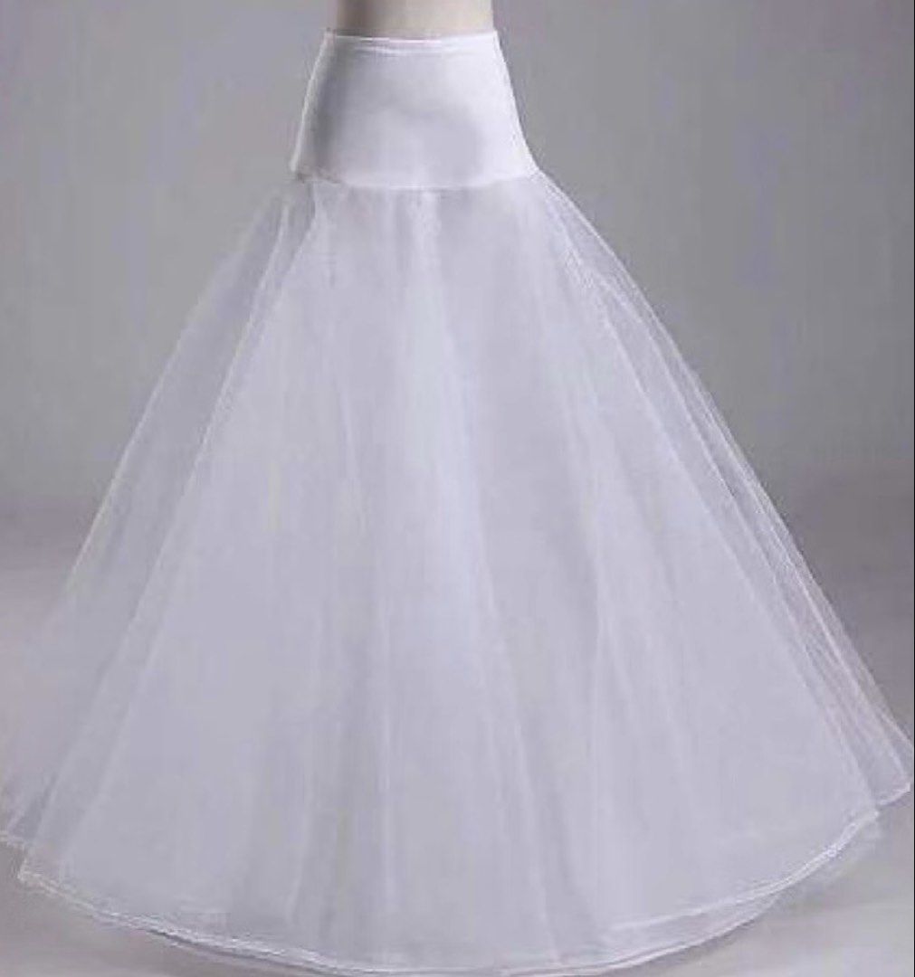 White Petticoat Underskirt for Gown (Category: Skirts) located in Manila. Submitted by jhie24 (Listing ID 1464524159, Image 1). Description: -Freesize - White underskirt for wedding dresses - Adds volume and shape for a beautiful princess silhouette - Comfortable elasticated waistband - Features multiple tulle layers - Delicate lace trim at the hem - Enhances the flow and movement of your gown -no metal hoops.