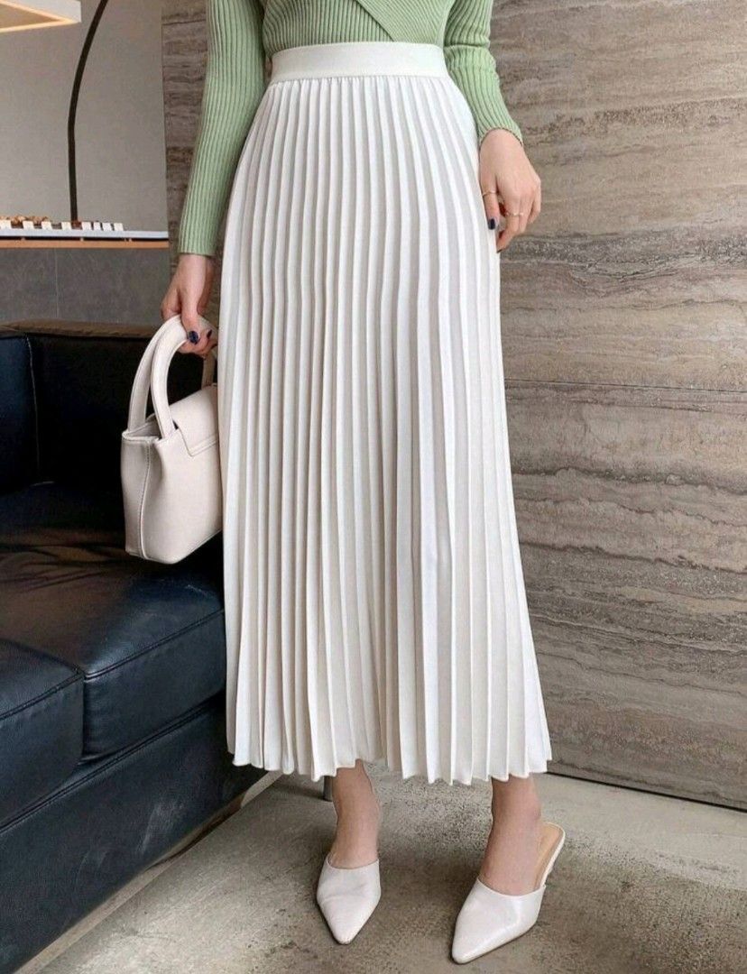 White Pleated Midi Skirt (Category: Skirts) located in Manila. Submitted by declutter1202 (Listing ID 1464544608, Image 2). Description: waist 25in loc: binondo manila.