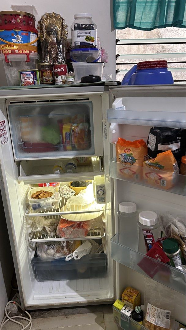 White Refrigerator with Freezer (Category: Refrigerators and Freezers) located in Makati City. Submitted by jaja_000011 (Listing ID 1464357532, Image 1). Description: - White refrigerator with built-in freezer - Multiple shelves and drawers for ample storage - Door shelves for bottles and smaller items - Keeps food and drinks perfectly cold.