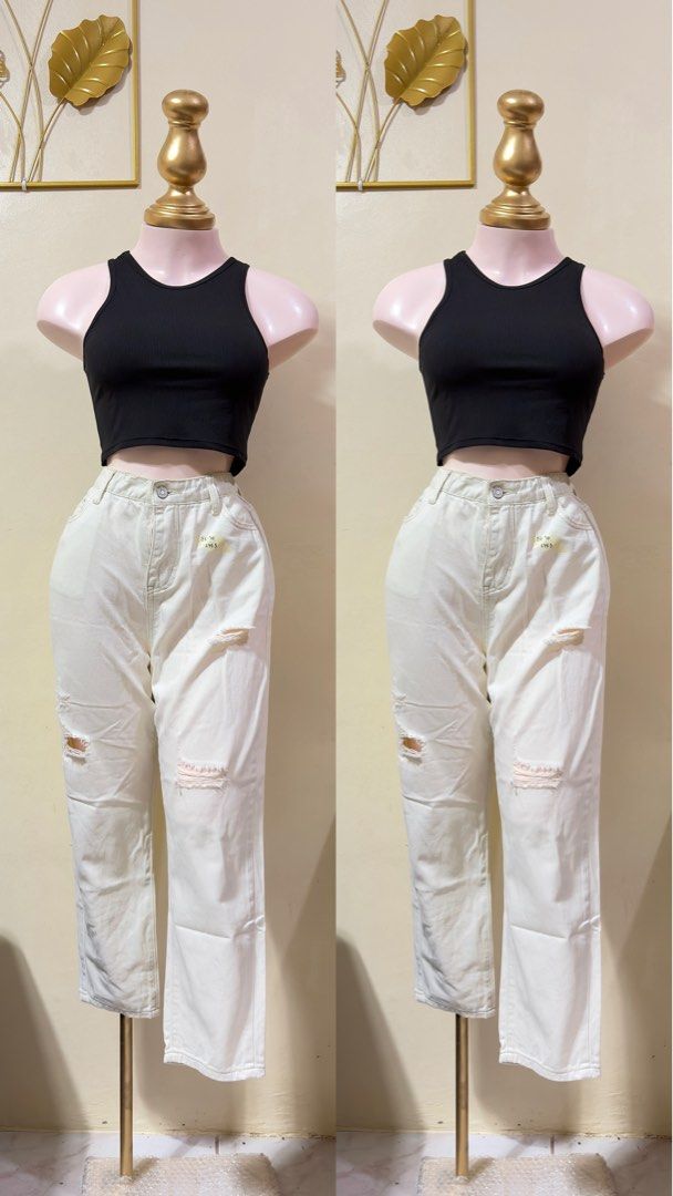 White Ripped jeans (Category: Jeans) located in Manila. Submitted by thrift.buddy.em (Listing ID 1464559903, Image 1). Description: - Trendy white mom jeans - Features stylish ripped details - Flattering high-waisted fit - Classic straight leg cut - Versatile for casual outfits - Waist: 28-30 inches - Length: 35.5 inches - Effortless to pair with any top.