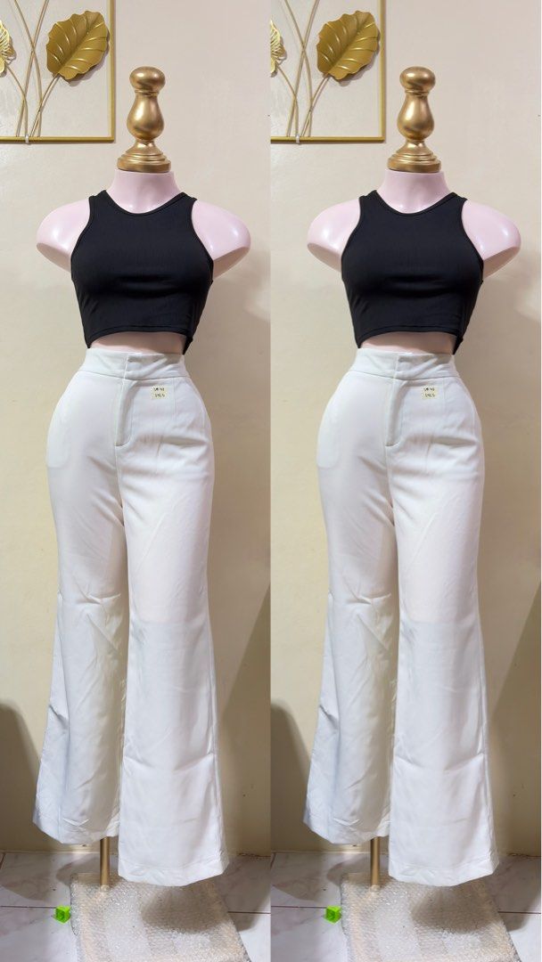 White Trouser Pants (Category: Jeans) located in Manila. Submitted by thrift.buddy.em (Listing ID 1464559636, Image 1). Description: - High-waisted white pants - Flattering wide-leg cut - Secure button and zip closure - Two functional front pockets - Waist: 29-30 inches - Length: 41.5 inches - Versatile: dress up or down.