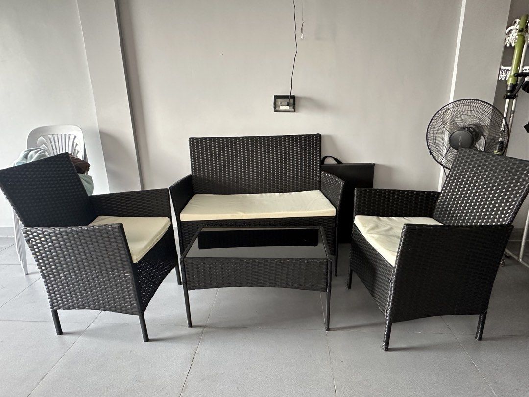 Wicker Outdoor Sofa, Chairs, and Coffee Table Set (Category: Outdoor Furniture) located in Manila. Submitted by kymrief (Listing ID 1464386352, Image 1). Description: - 4-piece outdoor furniture set - Includes: 1x two-seater sofa, 2x armchairs, 1x coffee table - Material: Durable black wicker - Cushions: Comfortable cream cushions, removable for easy cleaning - Coffee table features a sleek glass top - Ideal for balconies, patios, or any outdoor 