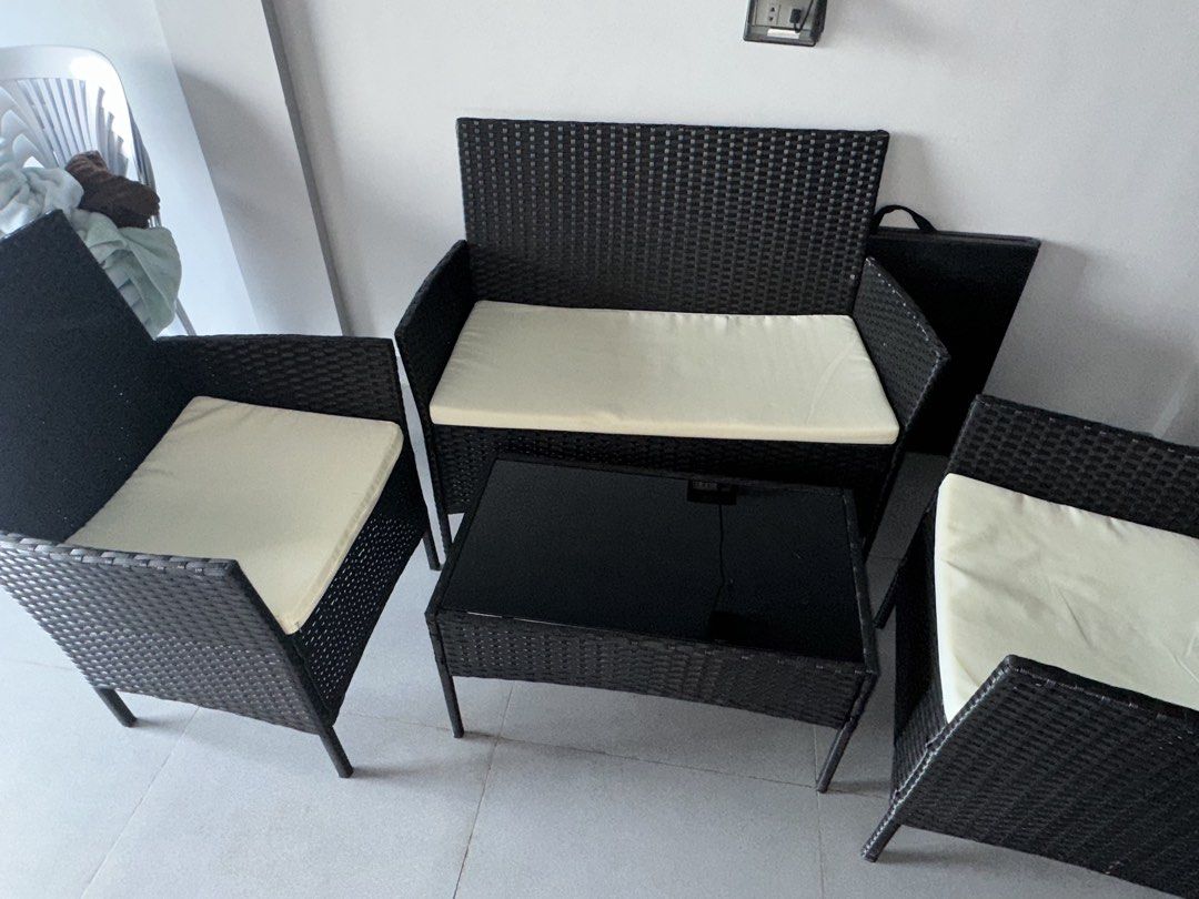 Wicker Outdoor Sofa, Chairs, and Coffee Table Set (Category: Outdoor Furniture) located in Manila. Submitted by kymrief (Listing ID 1464386352, Image 3). Description: - 4-piece outdoor furniture set - Includes: 1x two-seater sofa, 2x armchairs, 1x coffee table - Material: Durable black wicker - Cushions: Comfortable cream cushions, removable for easy cleaning - Coffee table features a sleek glass top - Ideal for balconies, patios, or any outdoor 