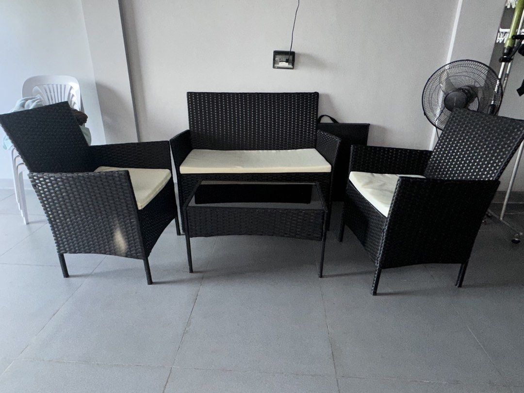 Wicker Outdoor Sofa, Chairs, and Coffee Table Set (Category: Outdoor Furniture) located in Manila. Submitted by kymrief (Listing ID 1464386352, Image 2). Description: - 4-piece outdoor furniture set - Includes: 1x two-seater sofa, 2x armchairs, 1x coffee table - Material: Durable black wicker - Cushions: Comfortable cream cushions, removable for easy cleaning - Coffee table features a sleek glass top - Ideal for balconies, patios, or any outdoor 