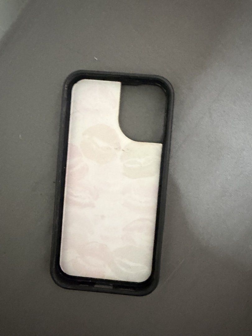 Wildflower Case Ip16 Pro (Category: Cases & Sleeves) located in Santa Rosa. Submitted by decluttering_. (Listing ID 1464520728, Image 3). Description: - NEGOTIABLE Authentic Wildflower (WF) case - Designed for iPhone 16 Pro - Features a vibrant kiss print design - Multiple shades of pink and red lips.
