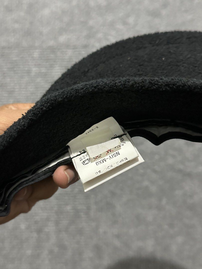 Wilson Black Terry Cloth Visor (Category: Caps & Hats) located in Villasis. Submitted by justinramosonfb (Listing ID 1464469575, Image 3). Description: - Black terry cloth visor by Wilson - Features embroidered 'W' logo on front - 'Wilson' embroidered on the side - Adjustable strap for a custom fit - Ideal for sports and everyday casual wear.