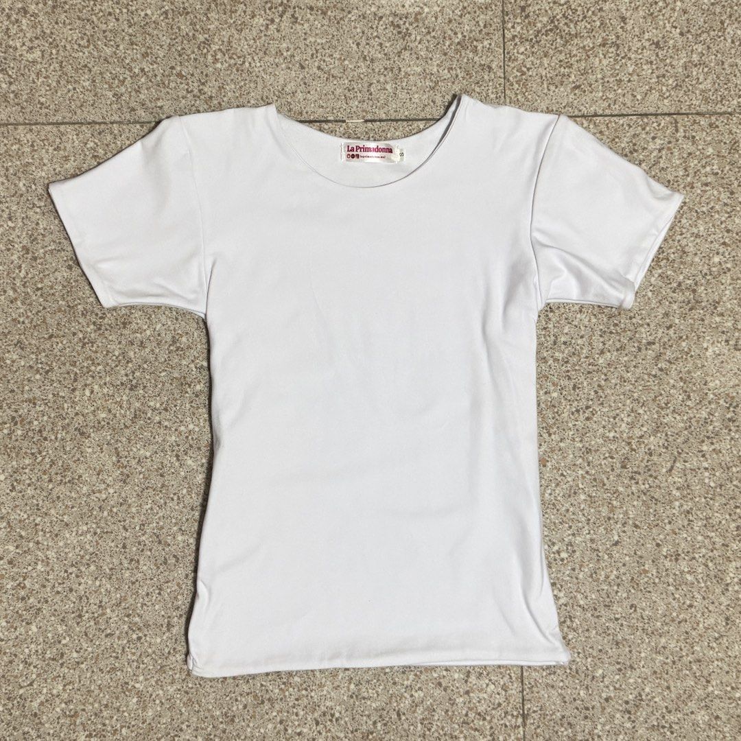 Women’s White Fitted Top (Category: Shirts) located in Manila. Submitted by ilovecheesyramen (Listing ID 1464380022, Image 1). Description: 🪩 never been used! quality is good as neww 🪩 super soft material 🪩 perfect for everyday wear 🪩 size S.