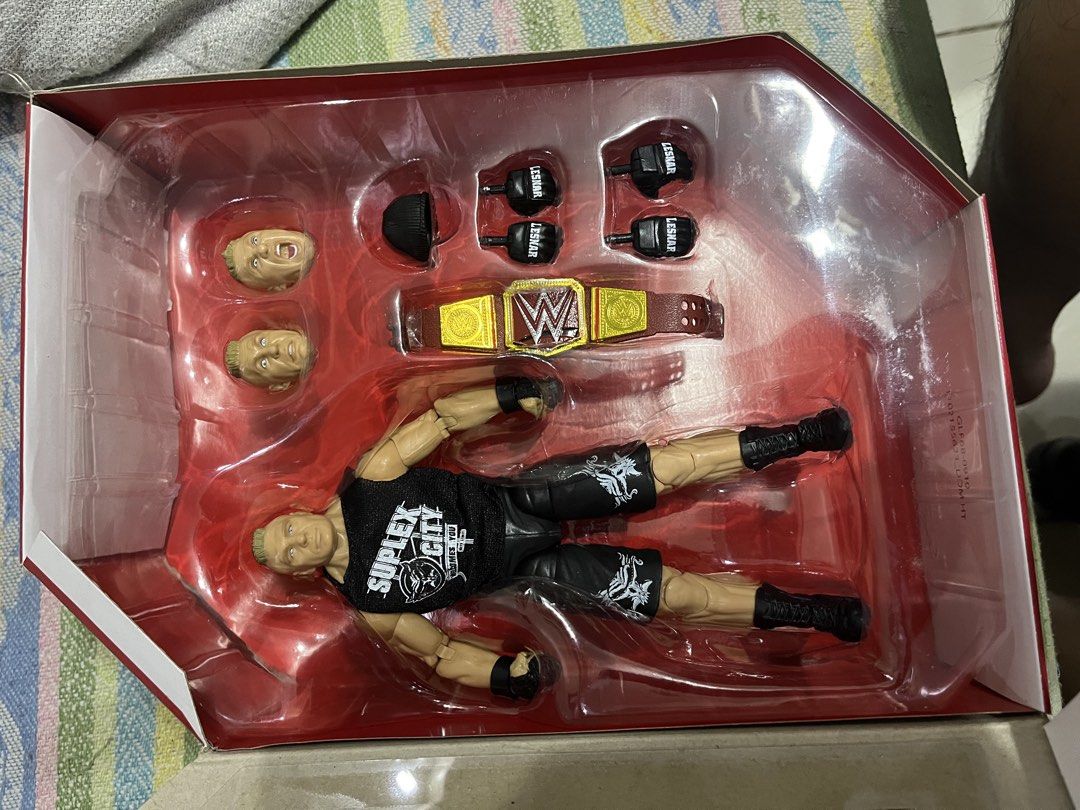 WWE Ultimate Edition Brock Lesnar Action Figure (Category: Figurines & Statues) located in Quezon City. Submitted by pau_h (Listing ID 1464397486, Image 2). Description: - Brock Lesnar Ultimate Edition figure - Authentic Mattel brand - Includes alternate heads for dynamic display - Comes with championship belt accessory - Extra hands for various posing options - Features excellent articulation for realistic poses - Ideal for any serious WWE colle