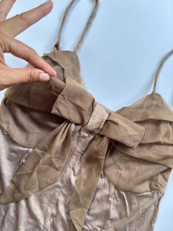 Y2k brown bow top (Category: Others Tops) located in San Enrique. Submitted by getsthrift (Listing ID 1464499238, Image 2). Description: s-m no issue.