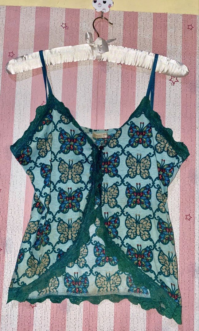 Y2k butterfly asymmetrical top (Category: Sleeveless) located in President Roxas. Submitted by cocoa_chanel (Listing ID 1464448504, Image 1). Description: Fits medium to large.