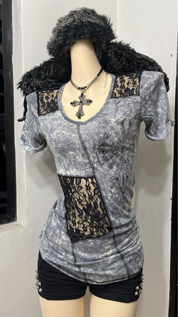 Y2k grunge graphic patchwork tee with lace design, studs and rhinestones (Category: Shirts) located in Caloocan City. Submitted by onlyfromthepast (Listing ID 1464419027, Image 1). Description: 9/10 condition S-m ✅My bio before purchasing tia💕 ✅ All items are fresh from bales, Pls expect dirt,dust or stains .