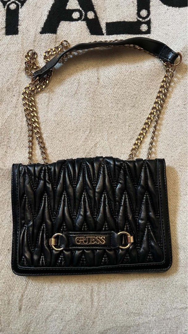 Y2k Guess (Category: Cross-body Bags) located in Cagayan de Oro. Submitted by akidomingo088 (Listing ID 1464523160, Image 1). Description: Y2k BLACK CHEVRON-QUILTED GUESS CROSSBODY BAG WITH GOLD STRAP AND CENTRAL LOGO PLAQUE . DM 📩.