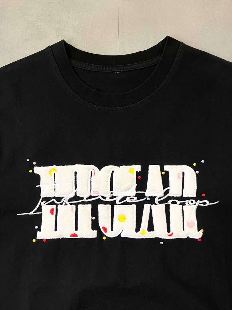 Y2k Infinite Loop Oversized tee shirt (Category: Tshirts & Polo Shirts ) located in Cabanatuan. Submitted by argarments.ph (Listing ID 1464469224, Image 3). Description: Tagged: fits Large Width 23" | Length 29" Condition: Good condition Issue(s): Pinhole. see photos.
