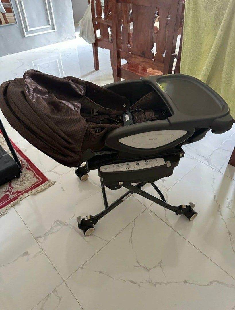 Electric Swing (Category: Other Kids Furniture) located in Angeles City. Submitted by sej_yuen (Listing ID 1464519438, Image 3). Description: Aprica Philippines Yuralism Auto Premium Aprica Online Store Original price ₱45,999.00 Selling only for 27,000 (negotiable for sure buyer interested) No Issue 🚫 What you see in pics is what you get 😊 UV-canopy that blocks light to 99.9% 4 sleep inducing atmospheres—no canopy or net in the morning, with ca