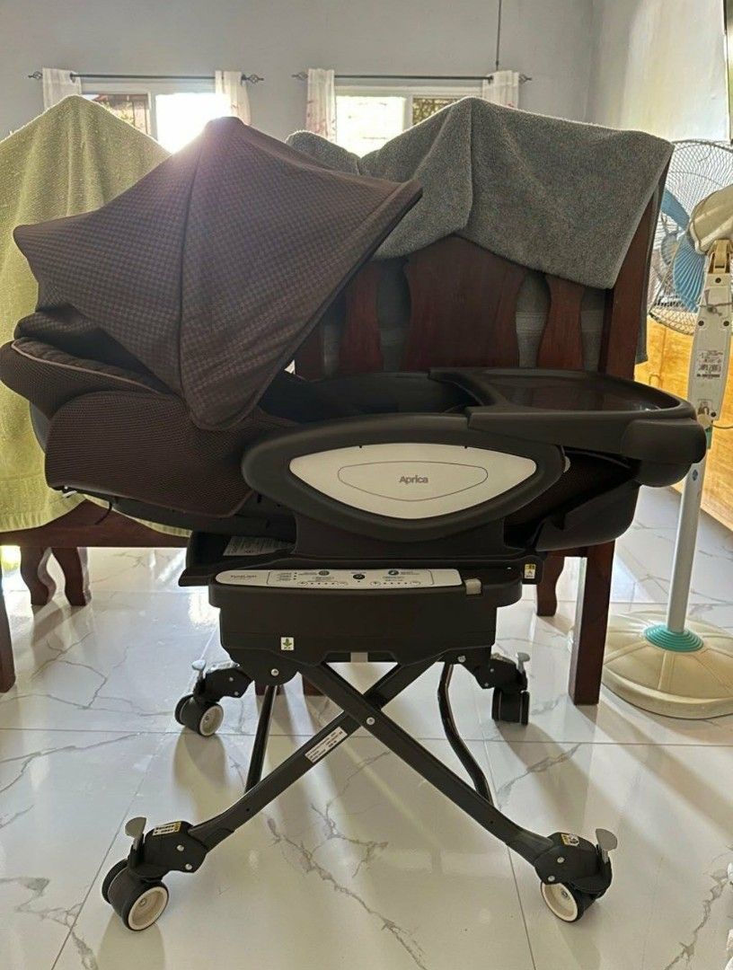 Electric Swing (Category: Other Kids Furniture) located in Angeles City. Submitted by sej_yuen (Listing ID 1464519438, Image 2). Description: Aprica Philippines Yuralism Auto Premium Aprica Online Store Original price ₱45,999.00 Selling only for 27,000 (negotiable for sure buyer interested) No Issue 🚫 What you see in pics is what you get 😊 UV-canopy that blocks light to 99.9% 4 sleep inducing atmospheres—no canopy or net in the morning, with ca