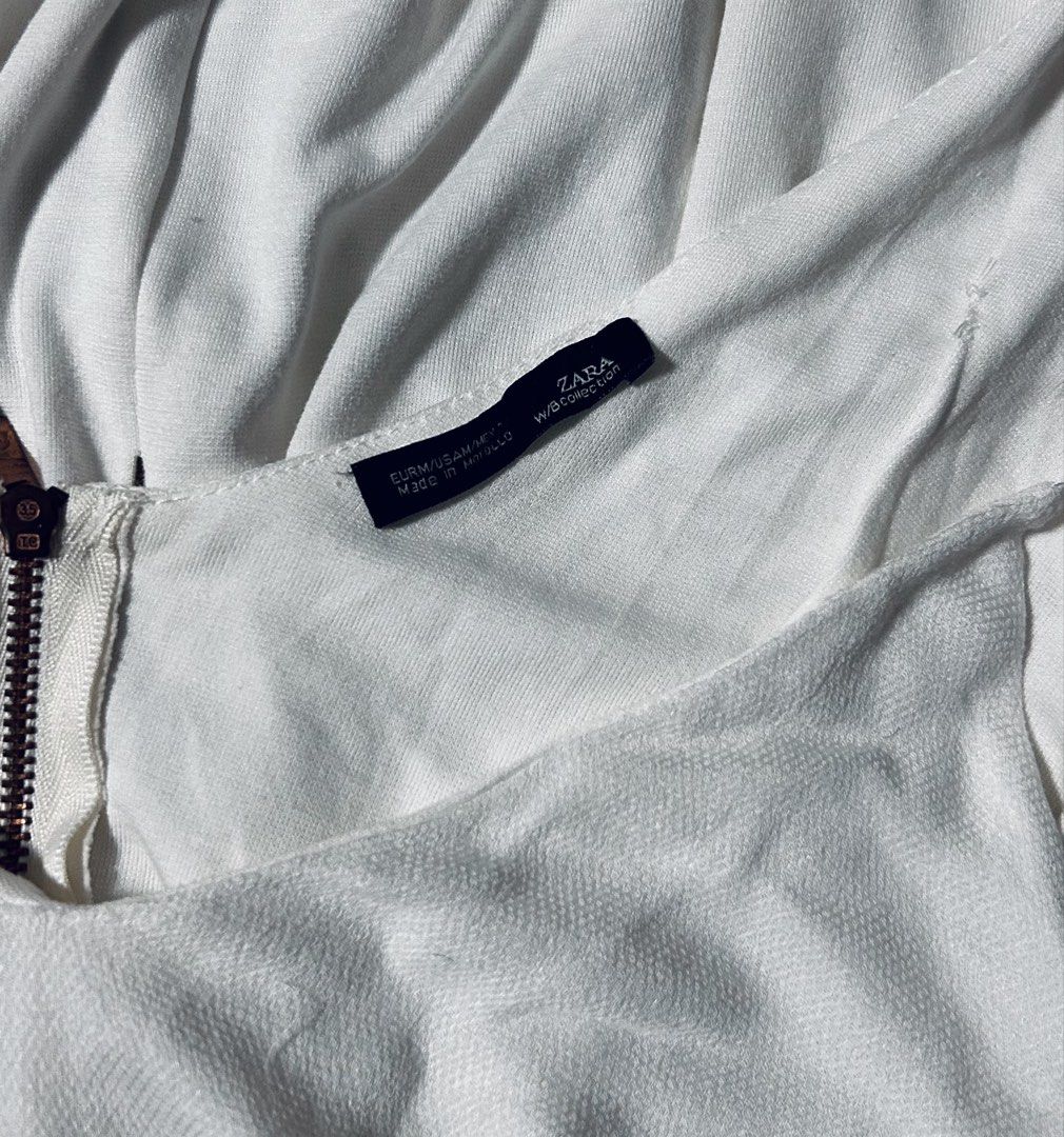 ZARA (Category: Dresses) located in Davao. Submitted by sart0ria85 (Listing ID 1464533112, Image 3). Description: White layered midi dress with back zipper. Details are removed. MADE IN MOROCCO 🇲🇦 MEDIUM. Size 6 EXCELLENT CONDITION (96/100) .