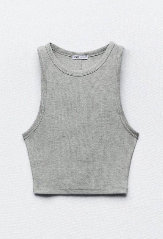 ZARA | Ribbed Halter Tank Top Grey (Category: Sleeveless) located in Makati City. Submitted by _rentorbuy (Listing ID 1464415196, Image 1). Description: - Sleeveless and cropped length - Stretchy material for comfort - Versatile: pairs well with jeans or shorts - Easy to layer.