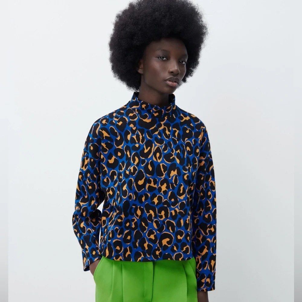 ZARA Blue Leopard Print Mock Neck Long Sleeve Top (Category: Longsleeves) located in La Trinidad. Submitted by rare_closet_finds (Listing ID 1464355347, Image 3). Description: - Cool blue top with a bold leopard print -size M on tag; -armpit to armpit 22” -length 21” - Features a mock neck and long sleeves - Comfortable fabric - Perfect for creating a statement look - Pairs well with bright pants or jeans.