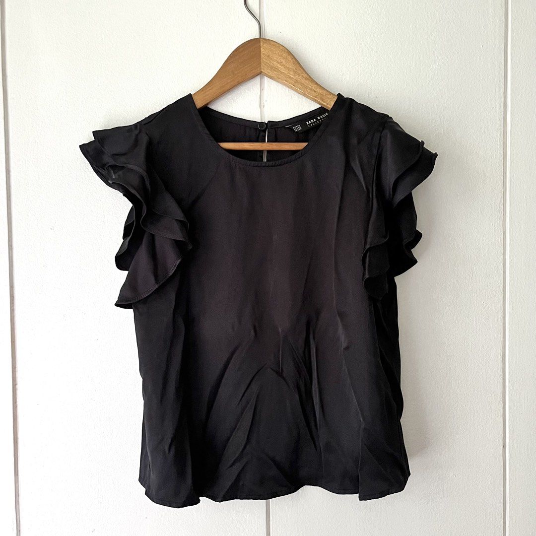 Zara Flutter Sleeve Top (Category: Blouses) located in Quezon City. Submitted by nchm88 (Listing ID 1464439123, Image 2). Description: Zara Flutter Sleeve Top - black color - flutter sleeve style - satin/silky fabric - size xs - good condition no damages or stains.